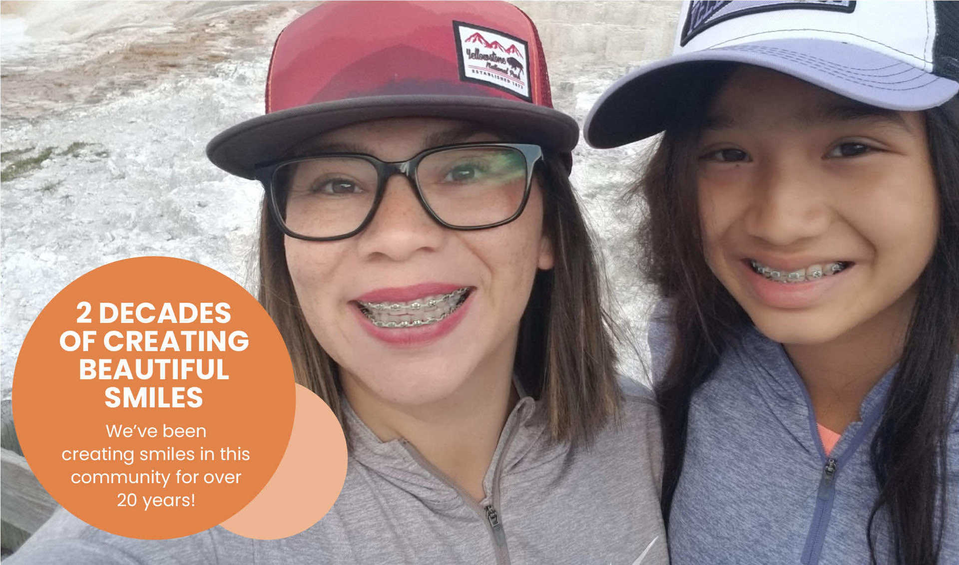 Two Girls with hats smiling